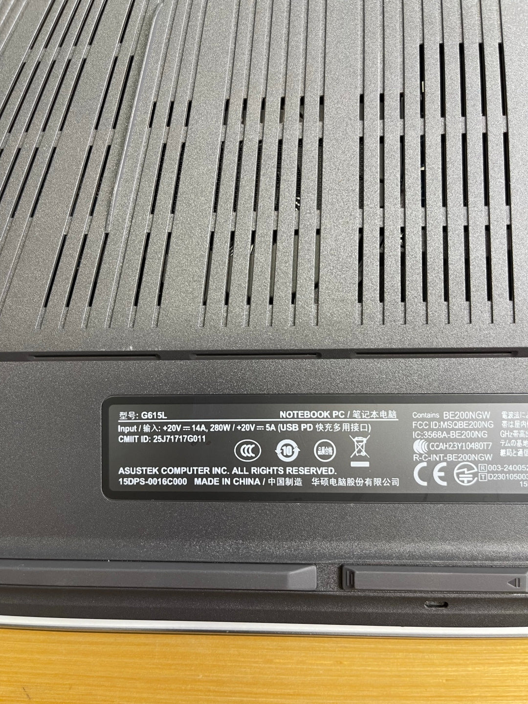 Close-up of the ASUS ROG Strix G16 model label reading G615L with 280W power input rating