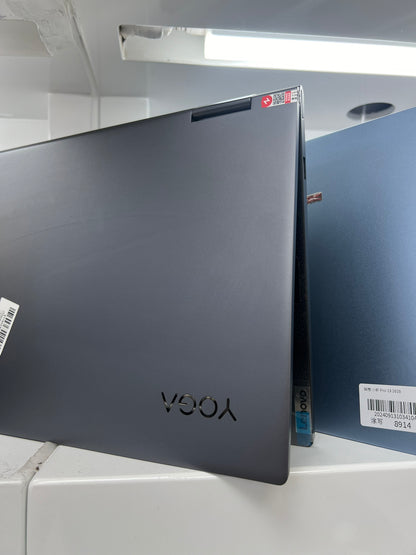 Side view of the closed Lenovo Yoga C740 showing the 360-degree hinges