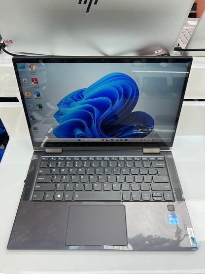 Lenovo Yoga C740 open front-on, showing the 14-inch touchscreen and backlit keyboard